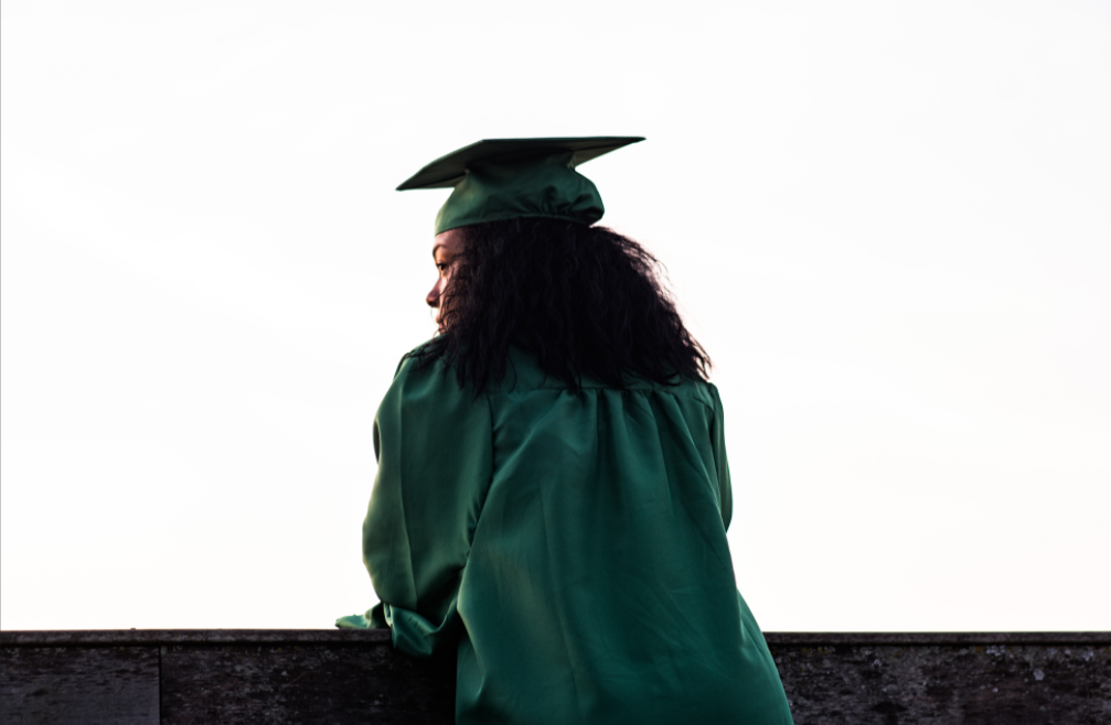 high school graduate thinking about future and college 