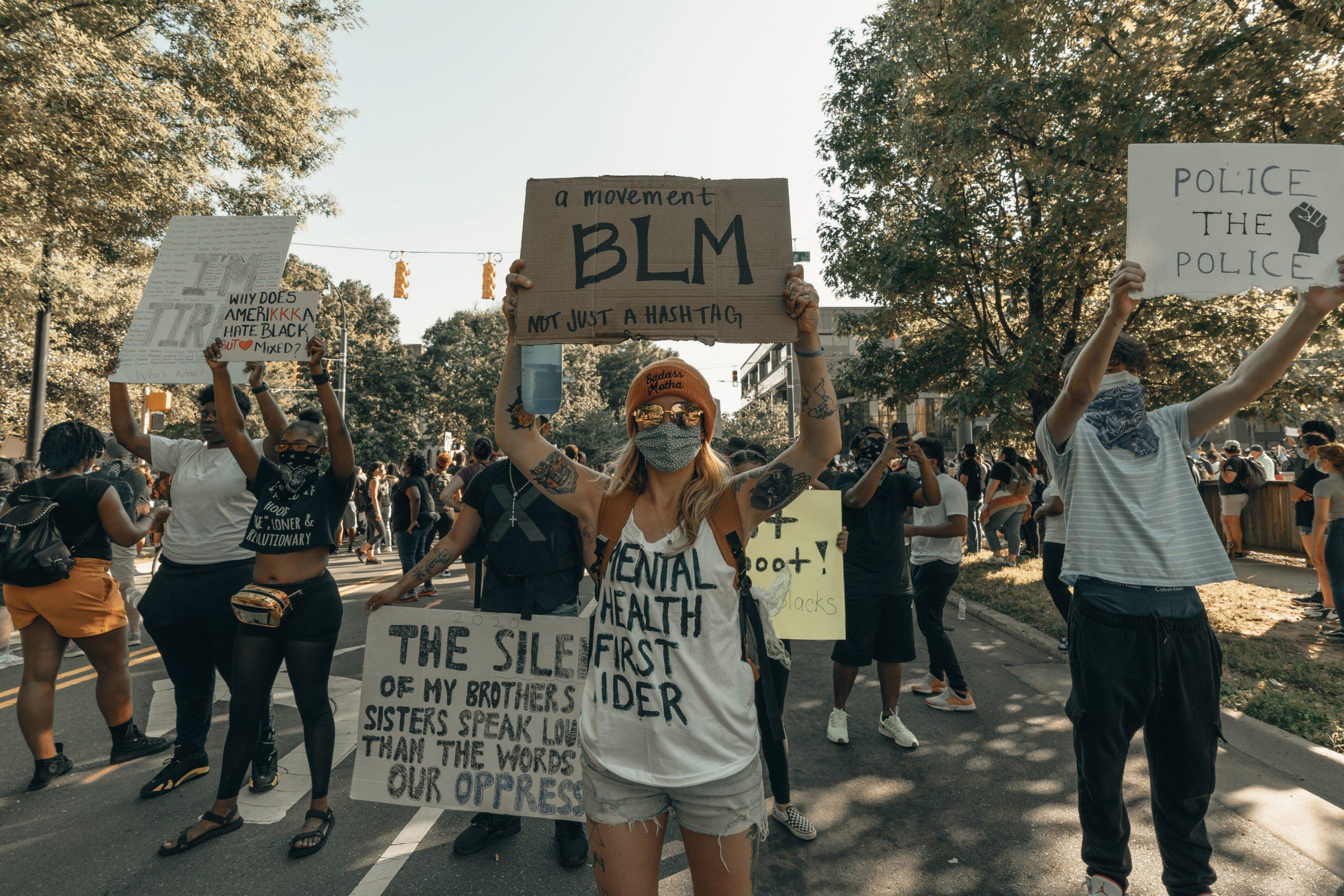 woman with BLM sign