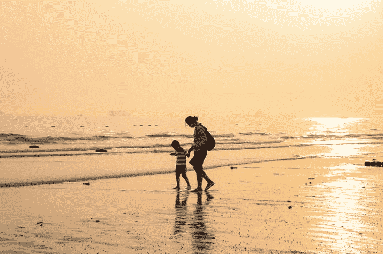 mom and son on the beach