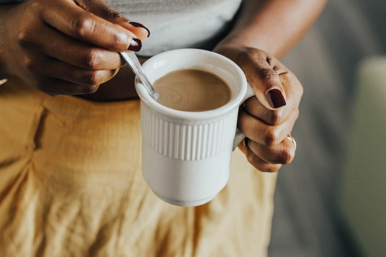 woman drinking coffee x