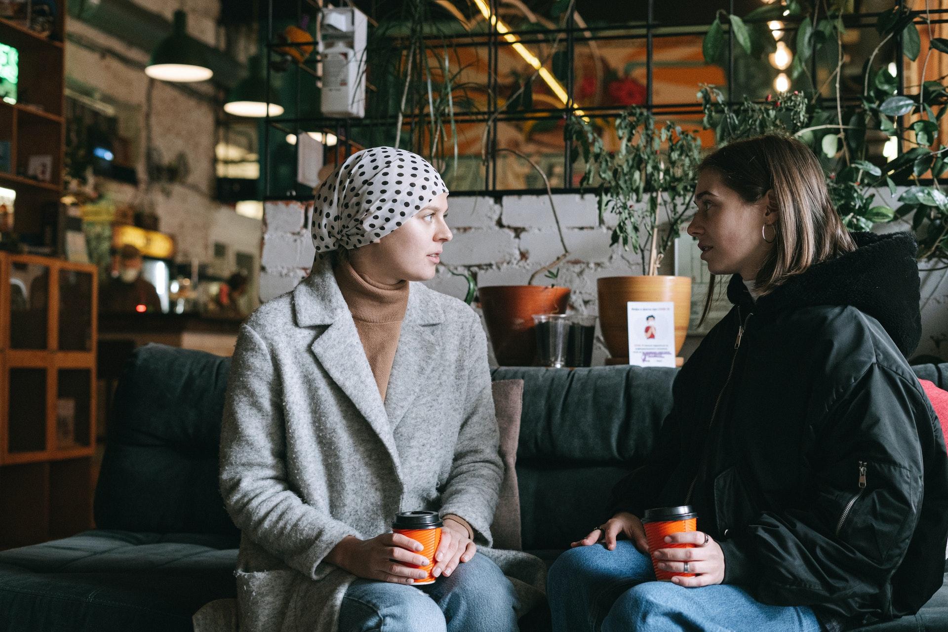 women talking at coffee shop