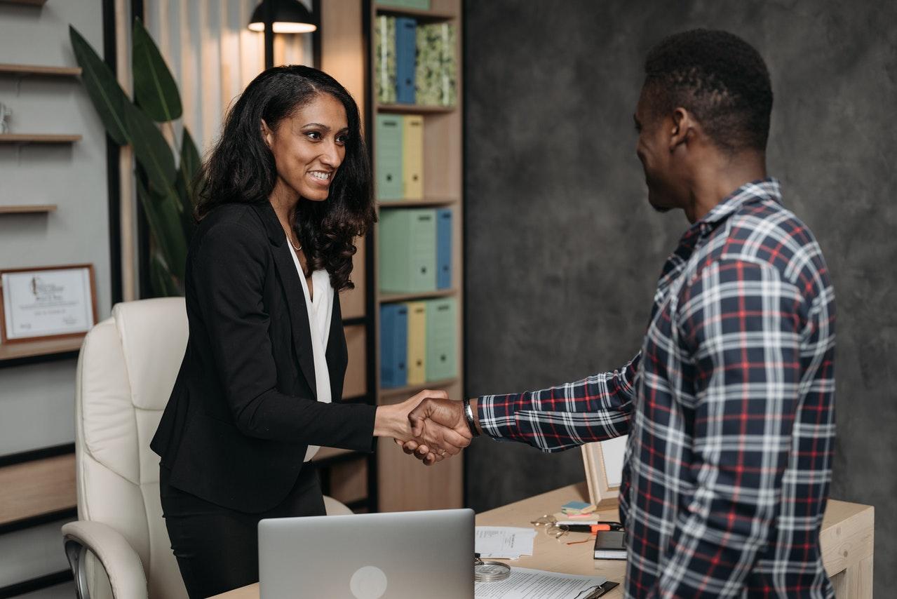 woman shaking hands