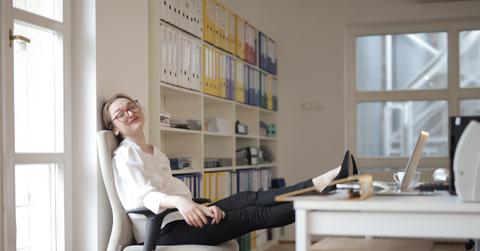 woman relaxing at office