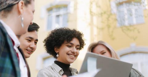 team looking at computer