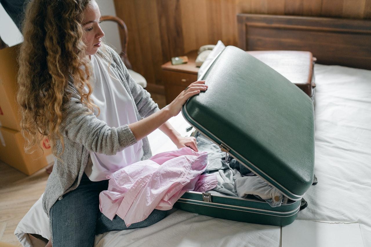 woman packing luggage