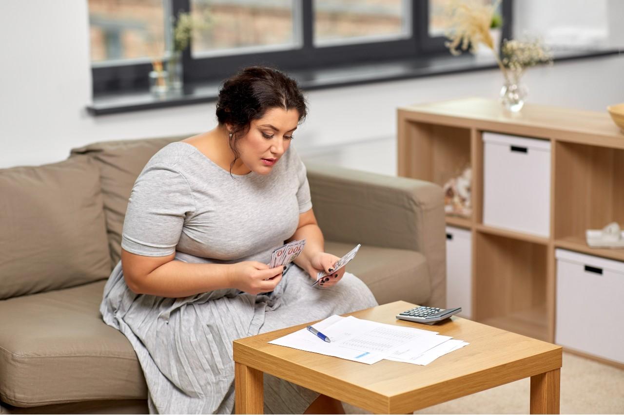 woman counting money