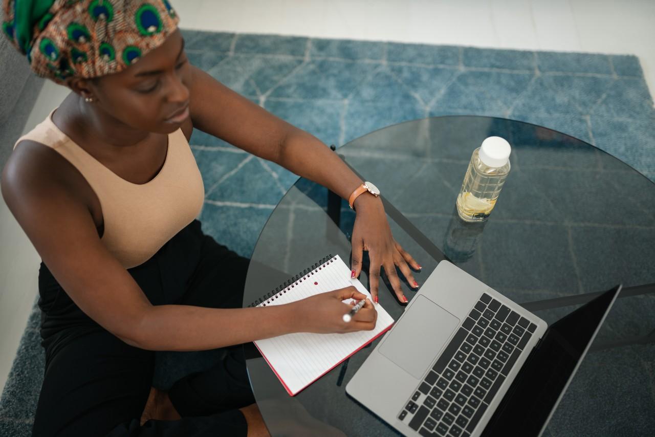 Black woman business owner at computer