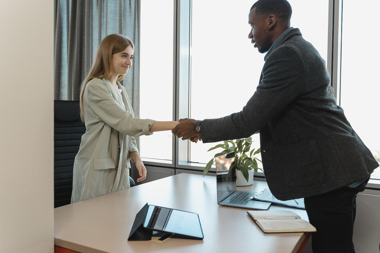 woman shaking hands