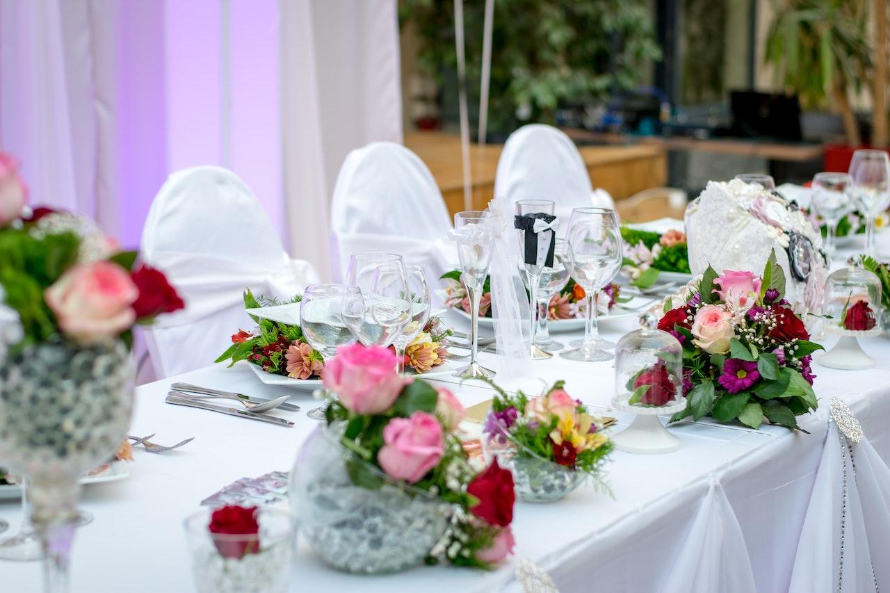 rose accents at dinner party