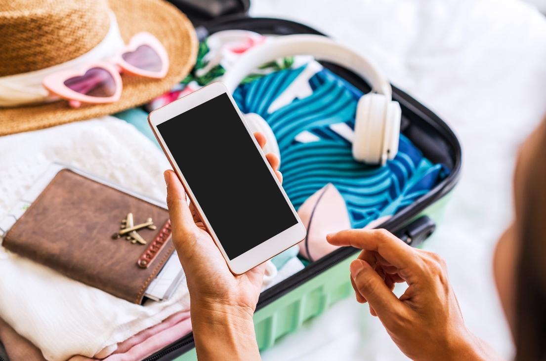 woman packing suitcase