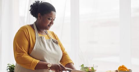 woman cutting vegetables