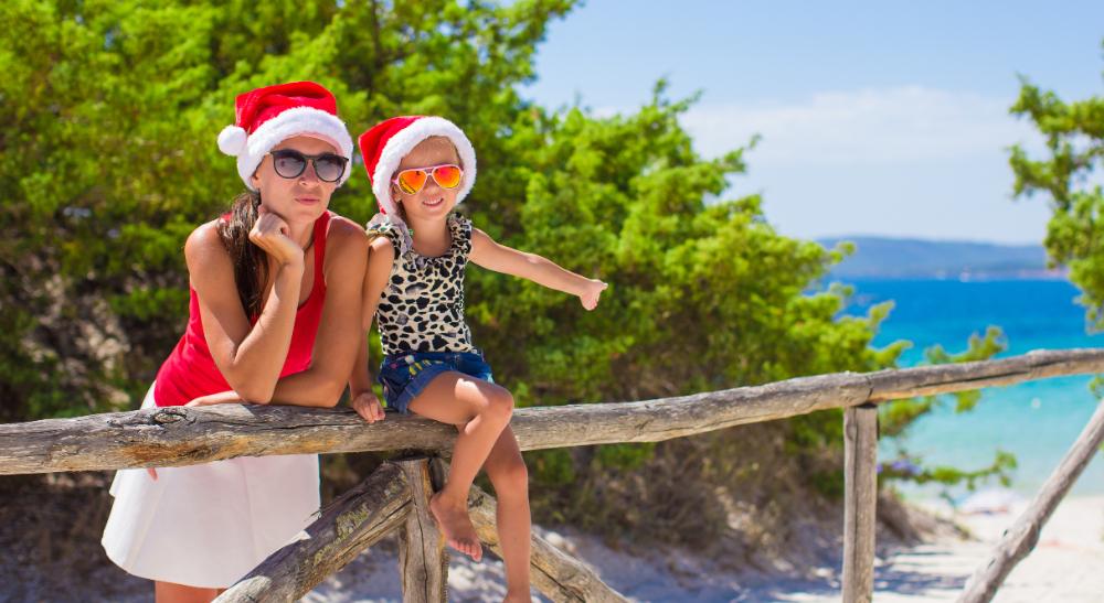 woman on beach with daughter