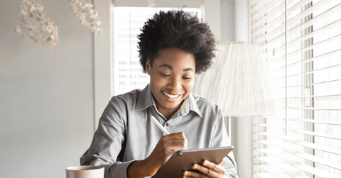 woman writing resolutions