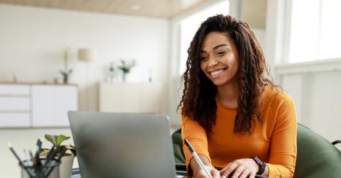 woman writing in journal