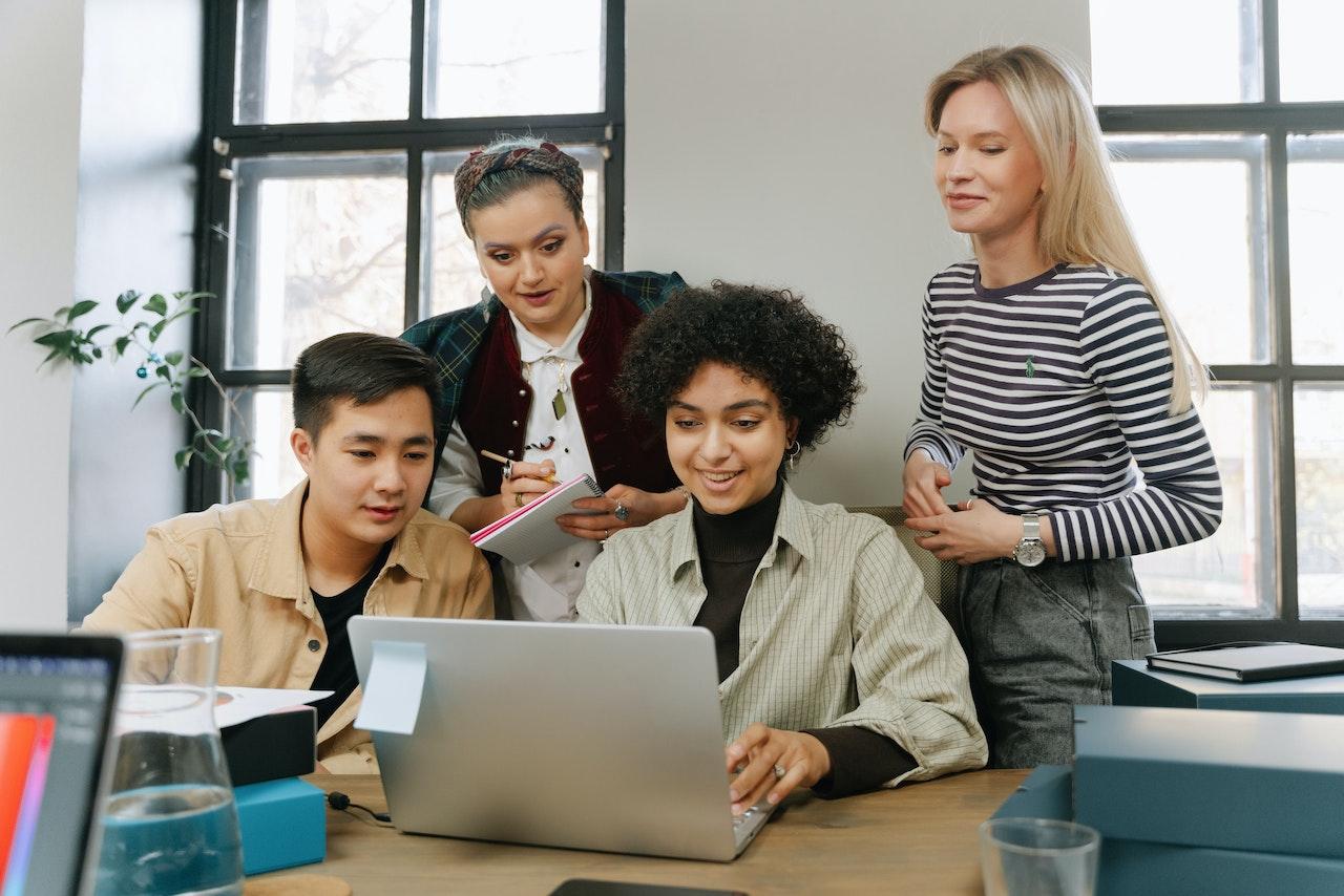 women in office on computer