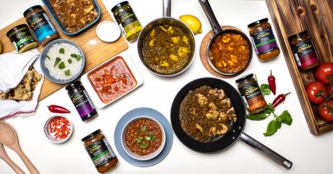 Sambar Kitchen jars and other Indian dishes on kitchen counter