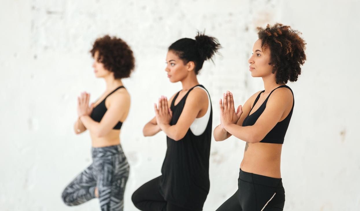 black women doing yoga