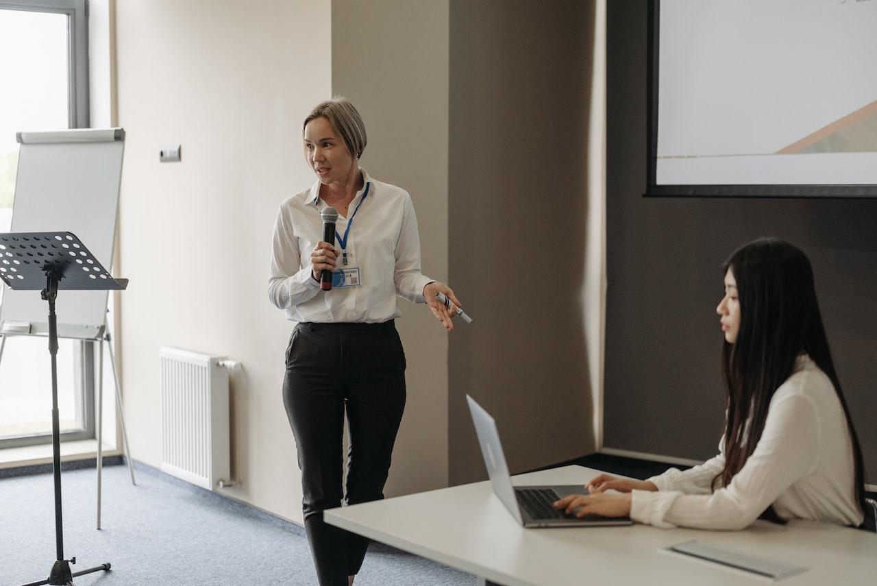 woman presenting to customers