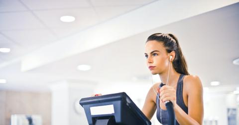 woman listening to podcast