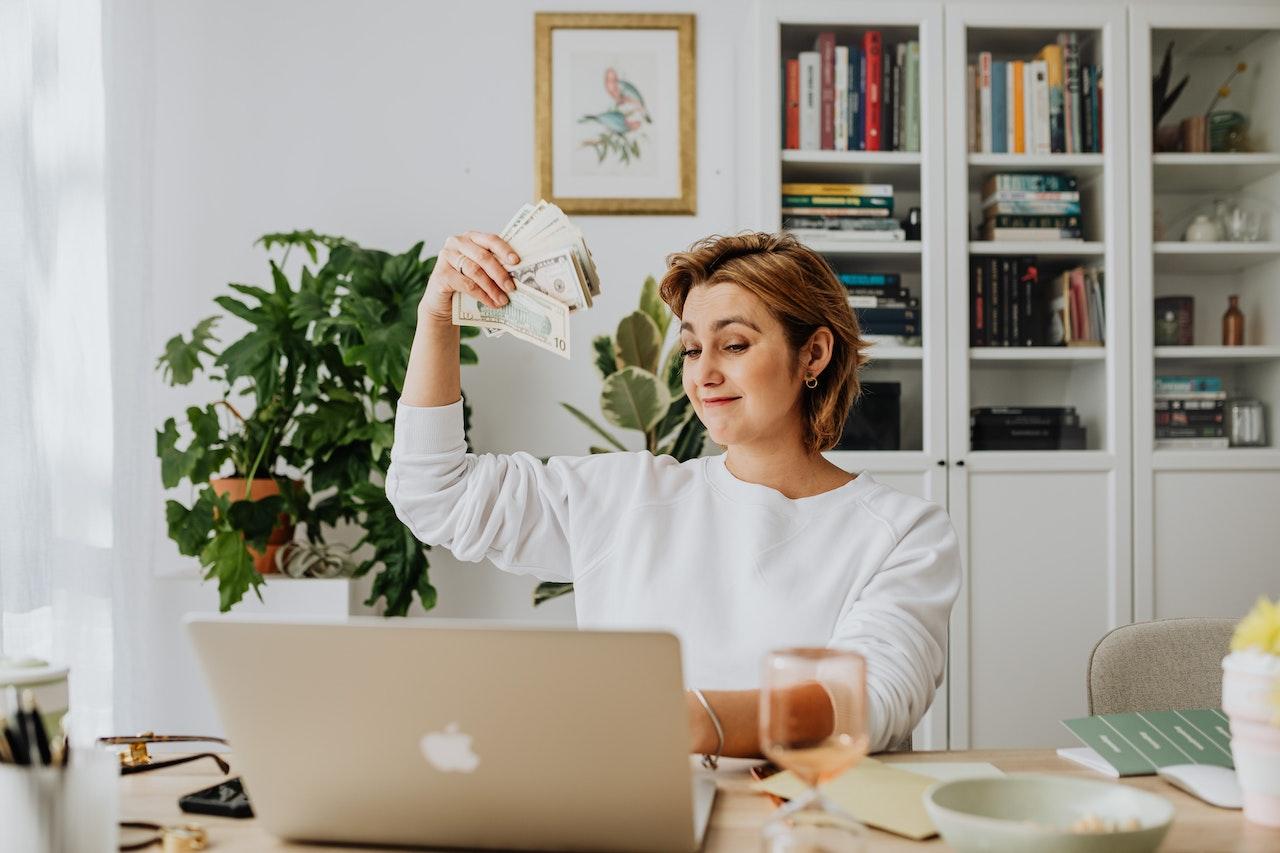 woman holding money