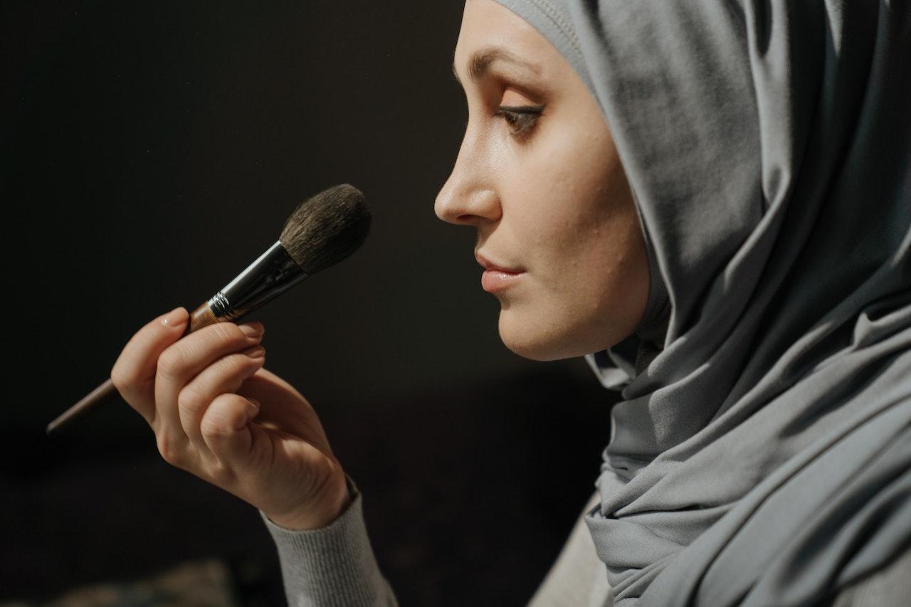 Woman doing makeup