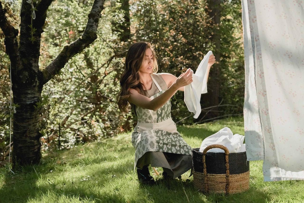 woman folding clothes