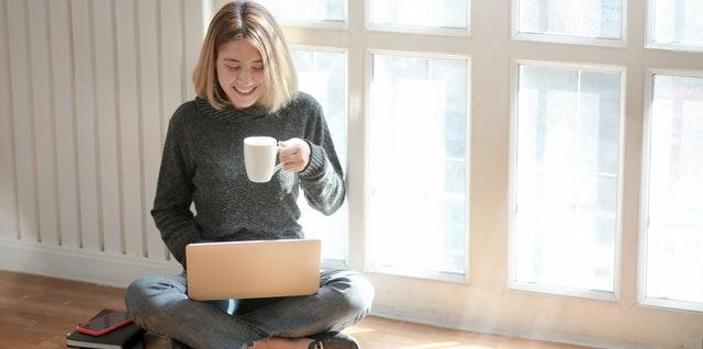 woman smiling with coffee 