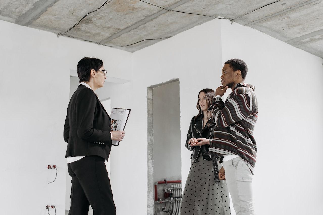 Woman helping couple with move