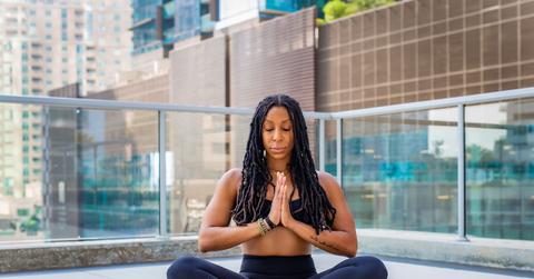 woman meditating on lunch break