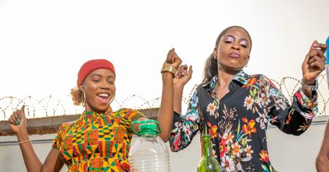 two young black women dancing at a party
