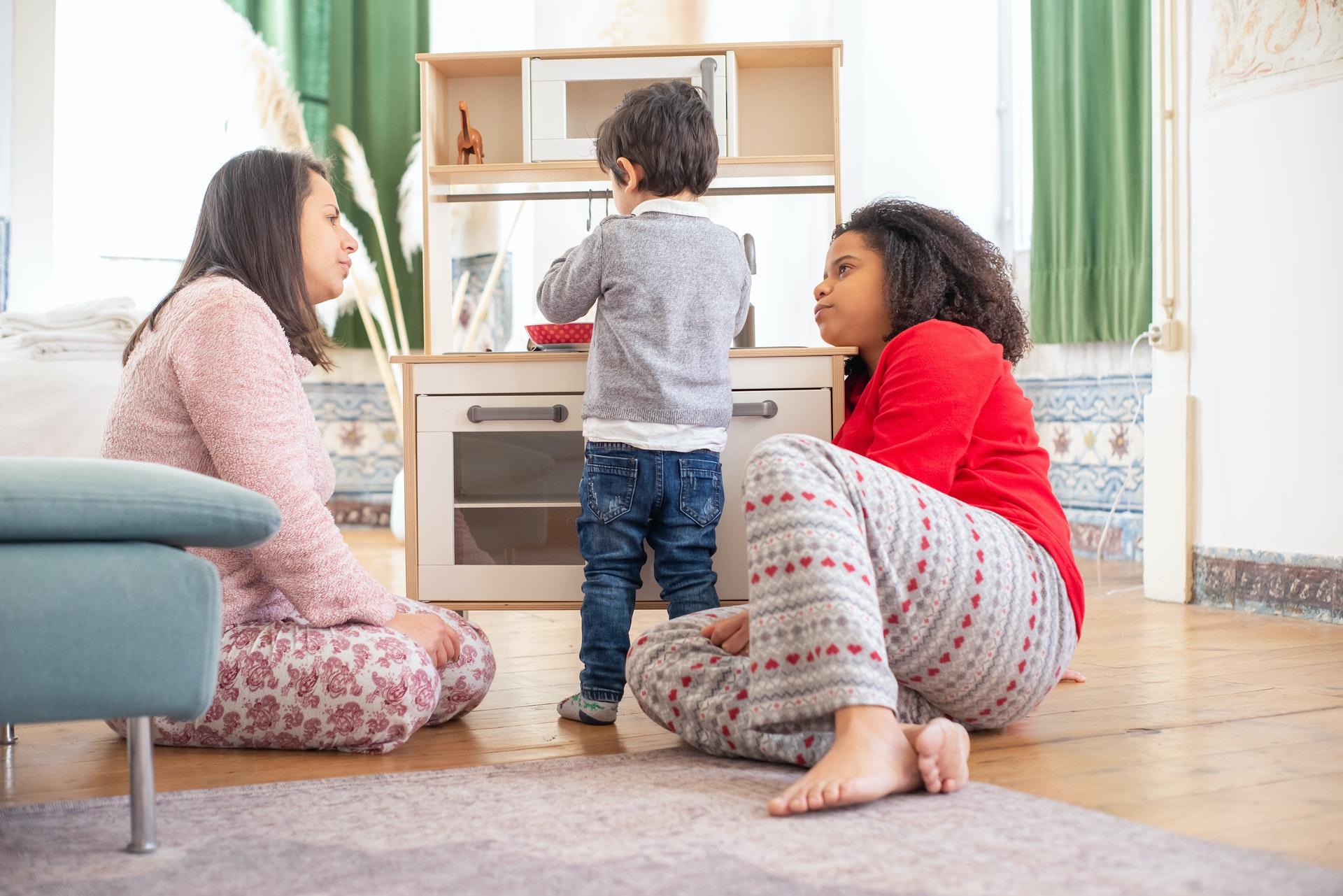 Couple in mild disagreement in front of their kid