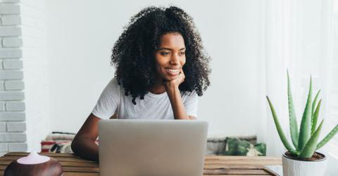 Black Woman Using Laptop at Home