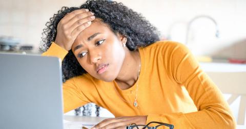 Woman Stressed on Laptop