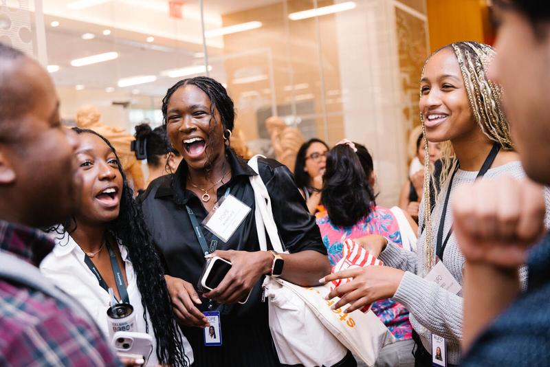 Power Talk attendees talking with each other at the event