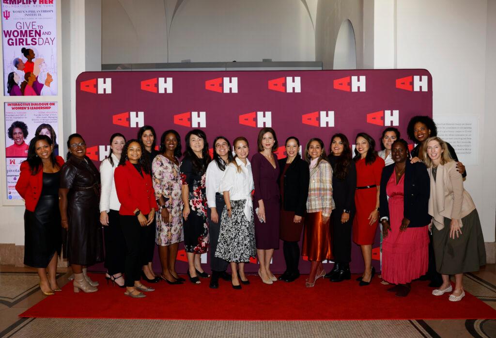 Amplify Her Founder, Marti Speranza Wong, posing with event attendees