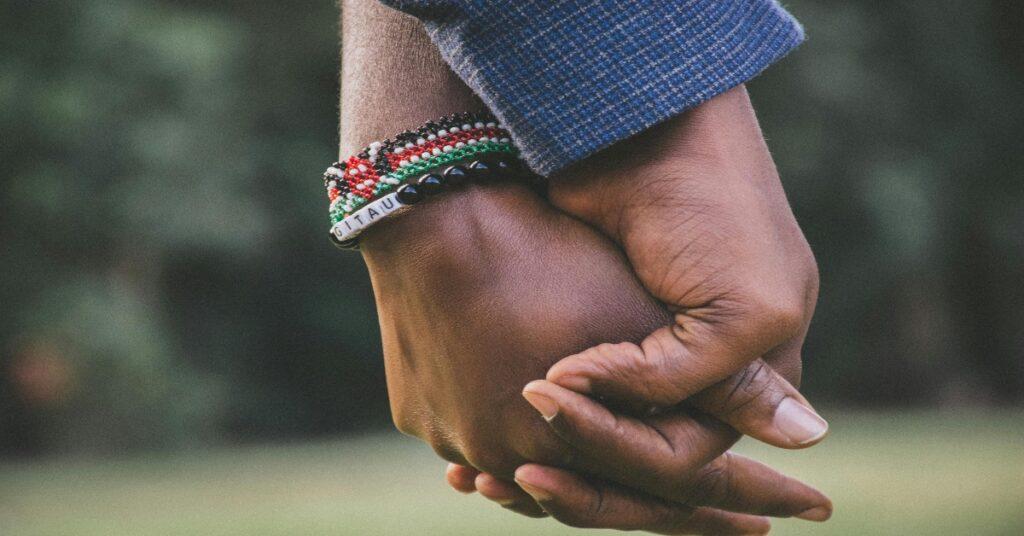 ///black couple holding hands x