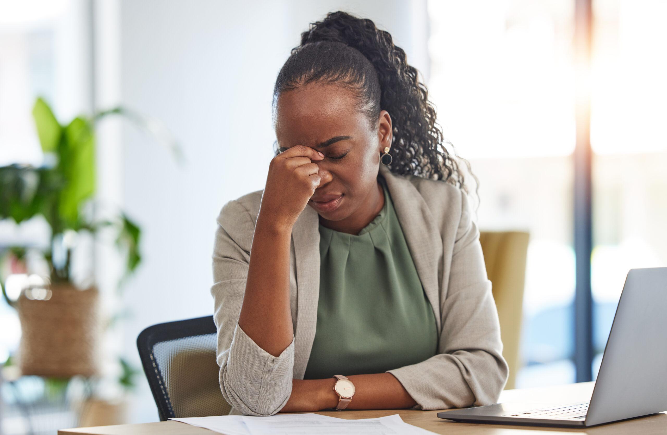 Crisis, stress and black woman with problem in office, sick or headache from brain fog. Frustrated, fatigue and African professional with business fail, mistake emoji or debt, bankruptcy or tax audit