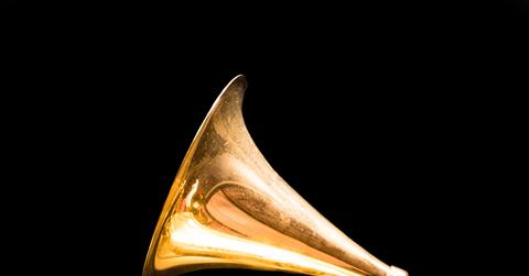 Golden Grammy Award against jet black background with NARAS inscription