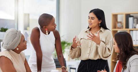 Diverse group, teamwork and young business women brainstorming, collaboration or cooperation. Ambitious confident professional team of colleagues talking and planning a marketing strategy together