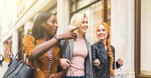 Multiracial group of women shopping and walking in the city