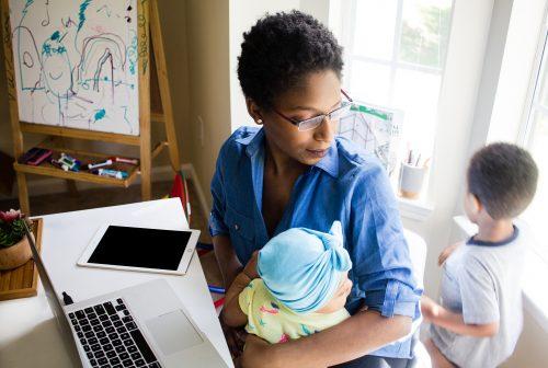 mother with kids working