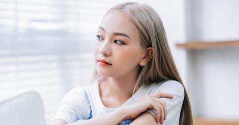 Portrait of young Asian girl feeling lonely