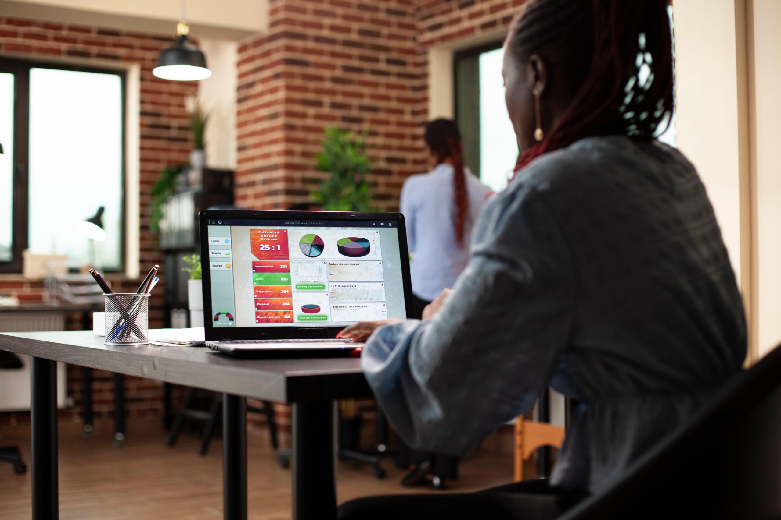 Business owner analyzing market trends