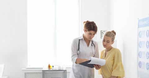 Patient having appointment with doctor in hospital