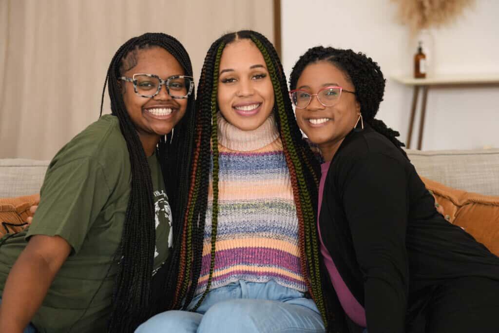 Camesha Jones-Brandon, founder of Sista Afya, with two other women