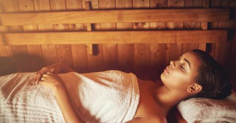 Blissful relaxation. Cropped shot of a young woman relaxing in the sauna at a spa.