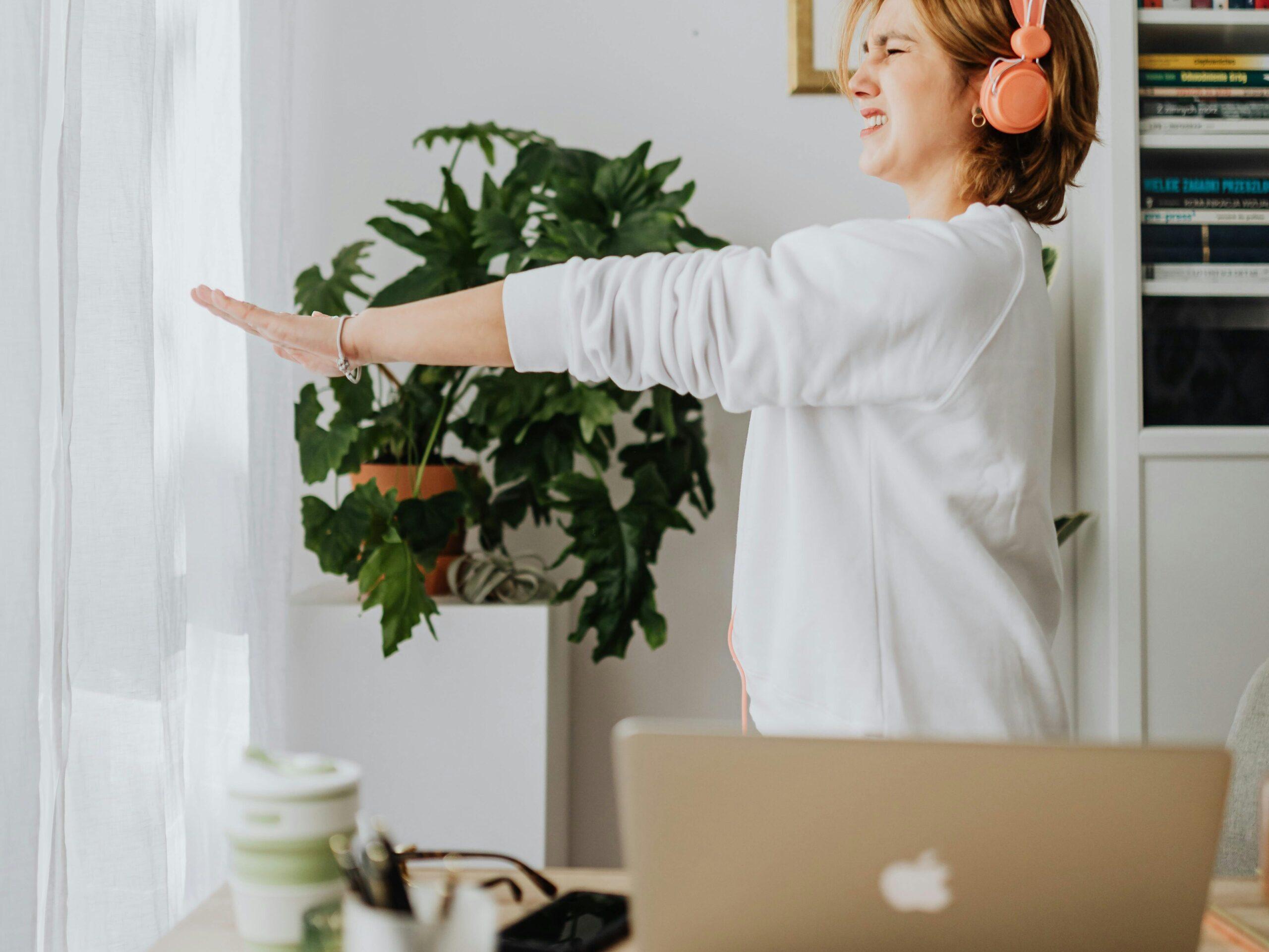 girl stretching at desk
