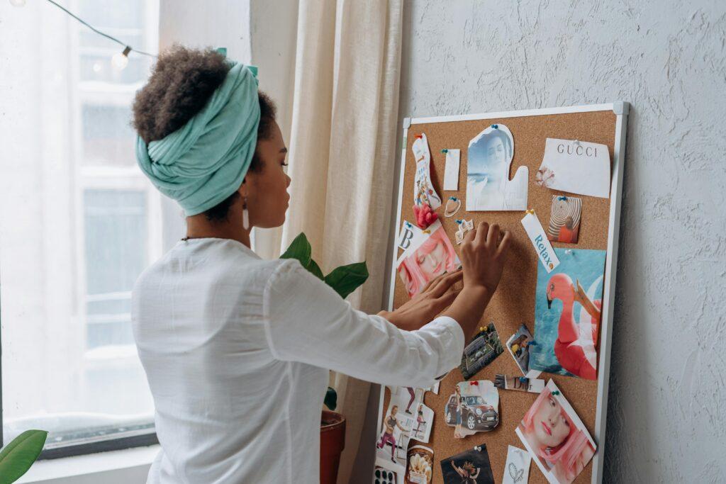 Woman sets up 2026 vision board