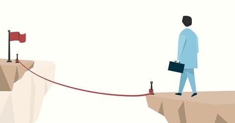 Man trying to reach goal