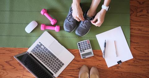 woman work and workout at home for healthy concept and work life